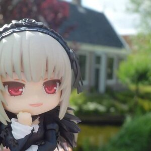 Rating: Safe Score: 0 Tags: 1girl 3d :d black_dress blurry doll dress frills hairband long_sleeves looking_at_viewer outdoors red_eyes smile solo suigintou wings User: admin
