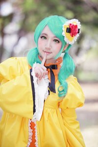 Rating: Safe Score: 0 Tags: 1girl aqua_hair blurry depth_of_field dress drill_hair finger_to_mouth food index_finger_raised kanaria lips lipstick long_hair makeup photo solo twintails yellow_dress User: admin