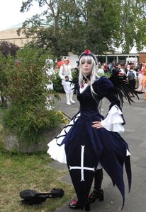 Rating: Safe Score: 0 Tags: 1girl black_dress boots dress flower hat long_hair photo solo standing suigintou tree User: admin