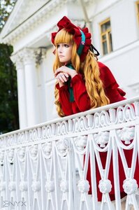 Rating: Safe Score: 0 Tags: 1girl blonde_hair blurry blurry_background bow depth_of_field dress hair_bow long_hair long_sleeves looking_at_viewer outdoors red_dress shinku solo standing User: admin