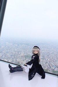 Rating: Safe Score: 0 Tags: 1girl boots closed_mouth doll dress frills high_heels long_hair long_sleeves looking_at_viewer sitting solo suigintou weapon User: admin