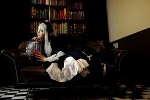 Rating: Safe Score: 0 Tags: 1girl argyle book book_stack bookshelf checkered checkered_background checkered_floor indoors instrument library long_hair sitting solo suigintou tile_floor tiles white_hair User: admin
