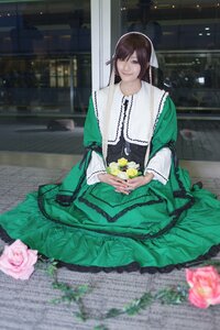 Rating: Safe Score: 0 Tags: 1girl blue_eyes blurry brown_hair dress flower green_dress long_sleeves looking_at_viewer pink_rose rose sitting smile solo suiseiseki User: admin