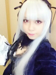 Rating: Safe Score: 0 Tags: 1girl bangs black_ribbon closed_mouth hair_ribbon looking_at_viewer photo red_eyes ribbon smile solo suigintou upper_body white_hair User: admin