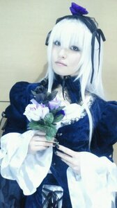 Rating: Safe Score: 0 Tags: 1girl black_dress blurry depth_of_field dress flower frills long_hair long_sleeves photo ribbon solo suigintou upper_body white_hair User: admin