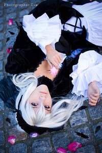 Rating: Safe Score: 0 Tags: 1girl dress frills gothic_lolita hat lips lolita_fashion long_hair long_sleeves lying on_back realistic solo suigintou watermark white_hair User: admin
