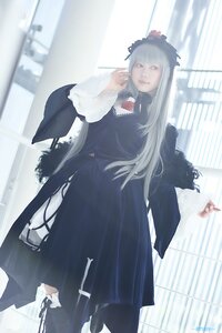 Rating: Safe Score: 0 Tags: 1girl bangs black_dress blurry depth_of_field dress long_hair long_sleeves solo standing suigintou User: admin