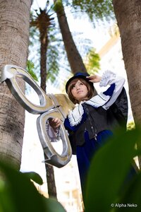 Rating: Safe Score: 0 Tags: 1girl blurry brown_hair capelet day depth_of_field dress hat long_sleeves outdoors short_hair solo souseiseki User: admin