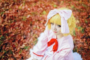Rating: Safe Score: 0 Tags: 1girl autumn_leaves blonde_hair blurry blurry_background blurry_foreground depth_of_field dress hinaichigo lips looking_at_viewer photo ribbon short_hair smile solo upper_body User: admin