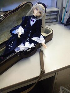 Rating: Safe Score: 0 Tags: 1girl doll dress frills long_hair long_sleeves photo sitting solo suigintou User: admin