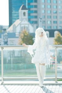 Rating: Safe Score: 0 Tags: 1girl blurry blurry_background blurry_foreground building day depth_of_field dress kirakishou long_sleeves outdoors photo railing solo standing white_dress white_hair User: admin