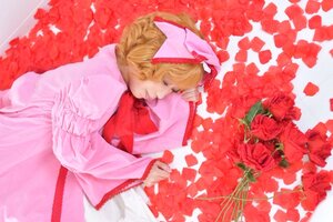 Rating: Safe Score: 0 Tags: 1girl blonde_hair bow closed_eyes dress flower hat hinaichigo long_sleeves lying petals red_flower ribbon rose short_hair solo traditional_media User: admin