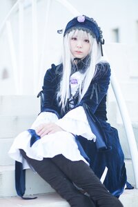 Rating: Safe Score: 0 Tags: 1girl bangs black_legwear blurry boots dress frills hat lips long_hair long_sleeves looking_at_viewer musical_note photo sitting solo suigintou white_hair User: admin