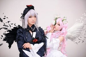 Rating: Safe Score: 0 Tags: 2girls black_wings dress feathers flower hairband long_hair multiple_cosplay multiple_girls pink_hair silver_hair suigintou tagme wings User: admin