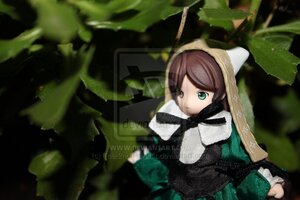 Rating: Safe Score: 0 Tags: 1girl black_dress blurry brown_hair doll dress green_eyes long_hair long_sleeves looking_at_viewer solo suiseiseki swept_bangs User: admin