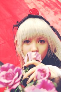 Rating: Safe Score: 0 Tags: 1girl bangs blonde_hair blurry blurry_foreground depth_of_field flower hairband looking_at_viewer pink_flower pink_rose red_flower red_rose rose solo suigintou User: admin