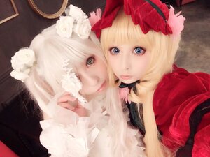 Rating: Safe Score: 0 Tags: 2girls bangs blonde_hair blue_eyes bow flower hair_bow lace lips looking_at_viewer multiple_cosplay multiple_girls rose tagme white_flower white_rose User: admin