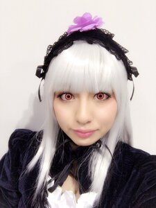 Rating: Safe Score: 0 Tags: 1girl bangs closed_mouth flower gothic_lolita hairband lips lolita_fashion long_hair looking_at_viewer red_eyes simple_background smile solo suigintou User: admin