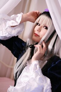 Rating: Safe Score: 0 Tags: 1girl blurry closed_mouth depth_of_field dress lips lolita_fashion long_hair long_sleeves looking_at_viewer realistic red_eyes ribbon rose sitting solo suigintou upper_body User: admin