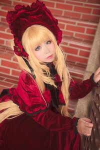 Rating: Safe Score: 0 Tags: 1girl bangs blonde_hair blue_eyes bonnet dress flower frills lips long_hair long_sleeves looking_at_viewer red_dress red_flower rose shinku solo User: admin