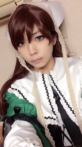 Rating: Safe Score: 0 Tags: 1girl bangs brown_hair closed_mouth dress frills green_dress hat head_scarf lips long_hair looking_at_viewer photo solo suiseiseki upper_body User: admin