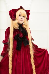 Rating: Safe Score: 0 Tags: 1girl blonde_hair blue_eyes bonnet bow dress flower long_hair looking_at_viewer red_dress rose shinku solo User: admin