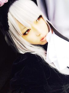 Rating: Safe Score: 0 Tags: 1girl bangs closed_mouth hood lips long_hair looking_at_viewer red_eyes red_lips solo suigintou white_hair User: admin