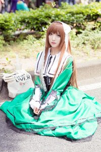 Rating: Safe Score: 0 Tags: 1girl bangs blurry blurry_background brown_hair day depth_of_field dress green_dress lips long_hair looking_at_viewer outdoors photo sitting solo suiseiseki User: admin