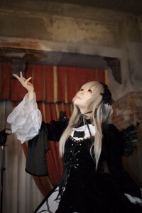 Rating: Safe Score: 0 Tags: 1girl black_dress black_wings blonde_hair closed_mouth dress frills gothic_lolita indoors lolita_fashion long_hair long_sleeves profile ribbon solo standing suigintou twintails wide_sleeves wings User: admin