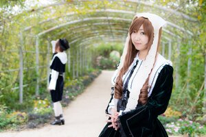 Rating: Safe Score: 0 Tags: 1boy 1girl black_dress blurry brown_hair depth_of_field dress flower hat long_hair multiple_cosplay outdoors standing tagme User: admin