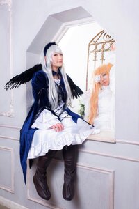 Rating: Safe Score: 0 Tags: 1girl 91076 angel_wings bird black_wings boots dress feathered_wings feathers frills lips long_hair long_sleeves multiple_cosplay sitting standing suigintou tagme white_hair wings User: admin