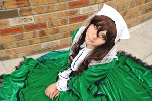 Rating: Safe Score: 0 Tags: 1girl brick_wall brown_hair dress green_dress heterochromia long_hair long_sleeves looking_at_viewer sitting smile solo suiseiseki tiles wall User: admin