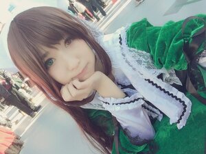 Rating: Safe Score: 0 Tags: 1girl brown_hair dress frills green_dress heterochromia long_hair long_sleeves looking_at_viewer photo smile solo suiseiseki User: admin