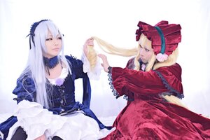 Rating: Safe Score: 0 Tags: 2girls blonde_hair bow dress food frills long_hair long_sleeves multiple_cosplay multiple_girls shinku silver_hair sitting suigintou tagme very_long_hair User: admin