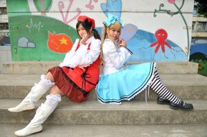 Rating: Safe Score: 0 Tags: 2girls blonde_hair boots long_hair multiple_cosplay multiple_girls photo sitting skirt striped striped_legwear tagme User: admin