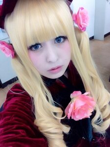 Rating: Safe Score: 0 Tags: 1girl bangs blonde_hair blue_eyes closed_mouth flower hair_ornament hat lips long_hair looking_at_viewer photo pink_flower pink_rose rose shinku solo traditional_media User: admin