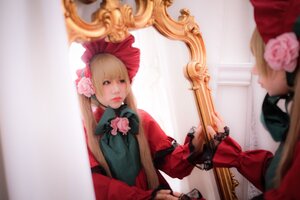 Rating: Safe Score: 0 Tags: 1girl blonde_hair blue_eyes blurry bow curtains depth_of_field dress flower hat instrument lips long_hair music photo pink_flower pink_rose playing_instrument realistic rose shinku sitting solo violin User: admin