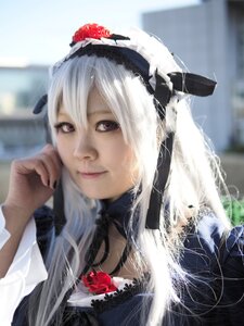 Rating: Safe Score: 0 Tags: 1girl blurry blurry_background closed_mouth depth_of_field flower hair_ornament lips long_hair looking_at_viewer photo red_flower red_rose rose solo suigintou User: admin