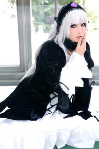 Rating: Safe Score: 0 Tags: 1girl bangs blue_eyes dress frills gothic_lolita lips lolita_fashion long_hair long_sleeves looking_at_viewer sitting solo suigintou white_hair User: admin