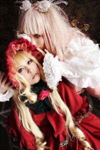 Rating: Safe Score: 0 Tags: 2girls bangs blonde_hair blue_eyes blunt_bangs dress flower frills lace lips long_hair multiple_cosplay multiple_girls shinku tagme User: admin