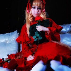 Rating: Safe Score: 0 Tags: 1girl bangs black_background blonde_hair blue_eyes bug butterfly dress drill_hair flower holding_flower insect long_hair long_sleeves red_flower red_rose rose shinku sitting solo white_rose User: admin