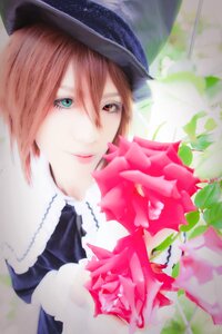 Rating: Safe Score: 0 Tags: 1girl black_headwear blurry bouquet brown_hair closed_mouth depth_of_field flower hair_between_eyes hat heterochromia looking_at_viewer red_eyes short_hair smile solo souseiseki top_hat User: admin