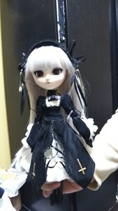 Rating: Safe Score: 0 Tags: 1girl bangs black_dress black_ribbon doll dress expressionless long_hair long_sleeves looking_at_viewer photo ribbon solo standing suigintou white_hair wings User: admin