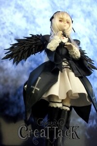 Rating: Safe Score: 0 Tags: 1girl black_dress blonde_hair blurry blurry_background depth_of_field doll dress long_sleeves red_eyes solo standing suigintou thighhighs wings User: admin