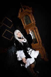 Rating: Safe Score: 0 Tags: 1girl boots dress feathers gothic_lolita indoors long_hair long_sleeves looking_at_viewer sitting solo suigintou white_hair window wings User: admin