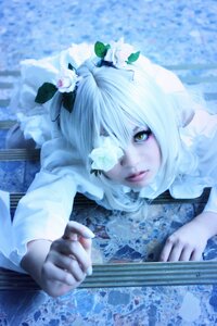 Rating: Safe Score: 0 Tags: 1girl blurry blurry_background blurry_foreground depth_of_field eyelashes flower green_eyes kirakishou lips looking_at_viewer solo water white_flower white_hair User: admin