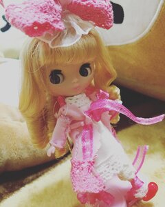 Rating: Safe Score: 0 Tags: 1girl blonde_hair bow doll dress full_body hair_bow hinaichigo long_hair photo pink_dress solo standing User: admin