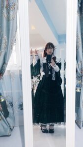 Rating: Safe Score: 0 Tags: 1girl black_footwear black_hair curtains dress full_body holding indoors long_sleeves shoes solo standing suiseiseki window User: admin
