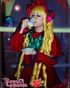 Rating: Safe Score: 0 Tags: 1girl blonde_hair bonnet closed_eyes cup dress drill_hair flower long_hair red_dress red_flower red_rose rose shinku solo teacup User: admin