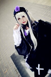 Rating: Safe Score: 0 Tags: 1girl dress flower frills gothic_lolita lips lolita_fashion long_hair purple_eyes rose solo suigintou white_hair User: admin